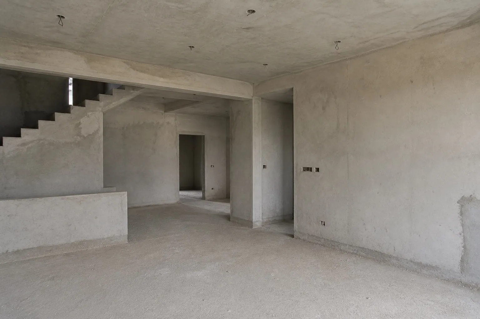 Reconstructed bare shell of the living room before interior work
